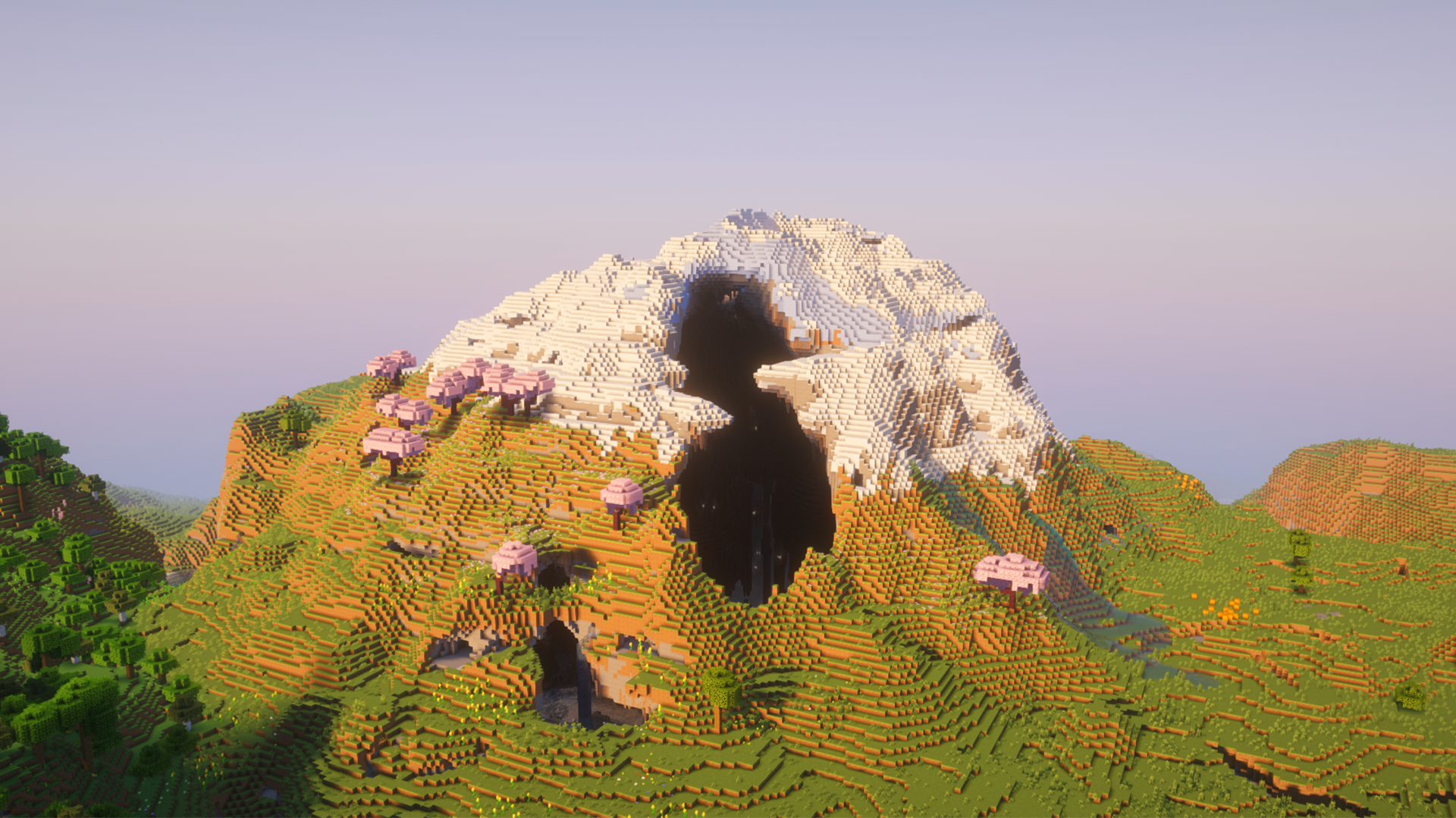 image of a Minecraft seed with a hollow frozen peaks mountain with deep dripstone cave