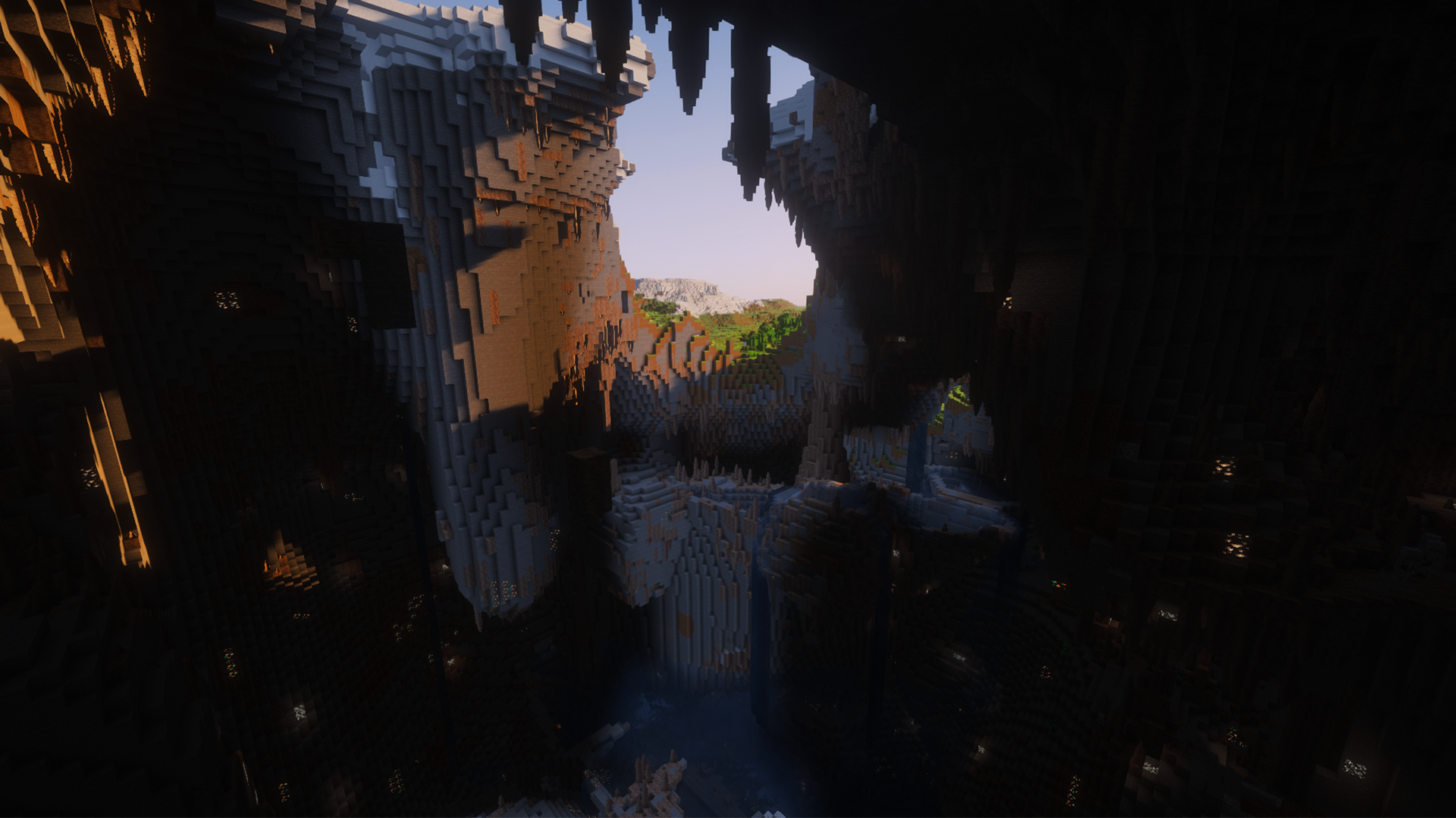 image of a Minecraft seed with a hollow frozen peaks mountain with deep dripstone cave