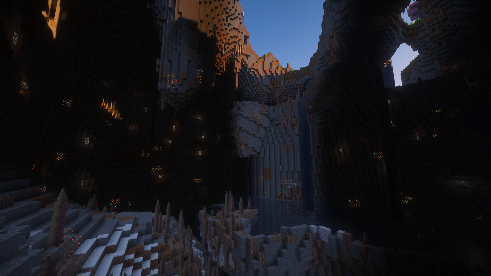 image of a Minecraft seed with a hollow frozen peaks mountain with deep dripstone cave