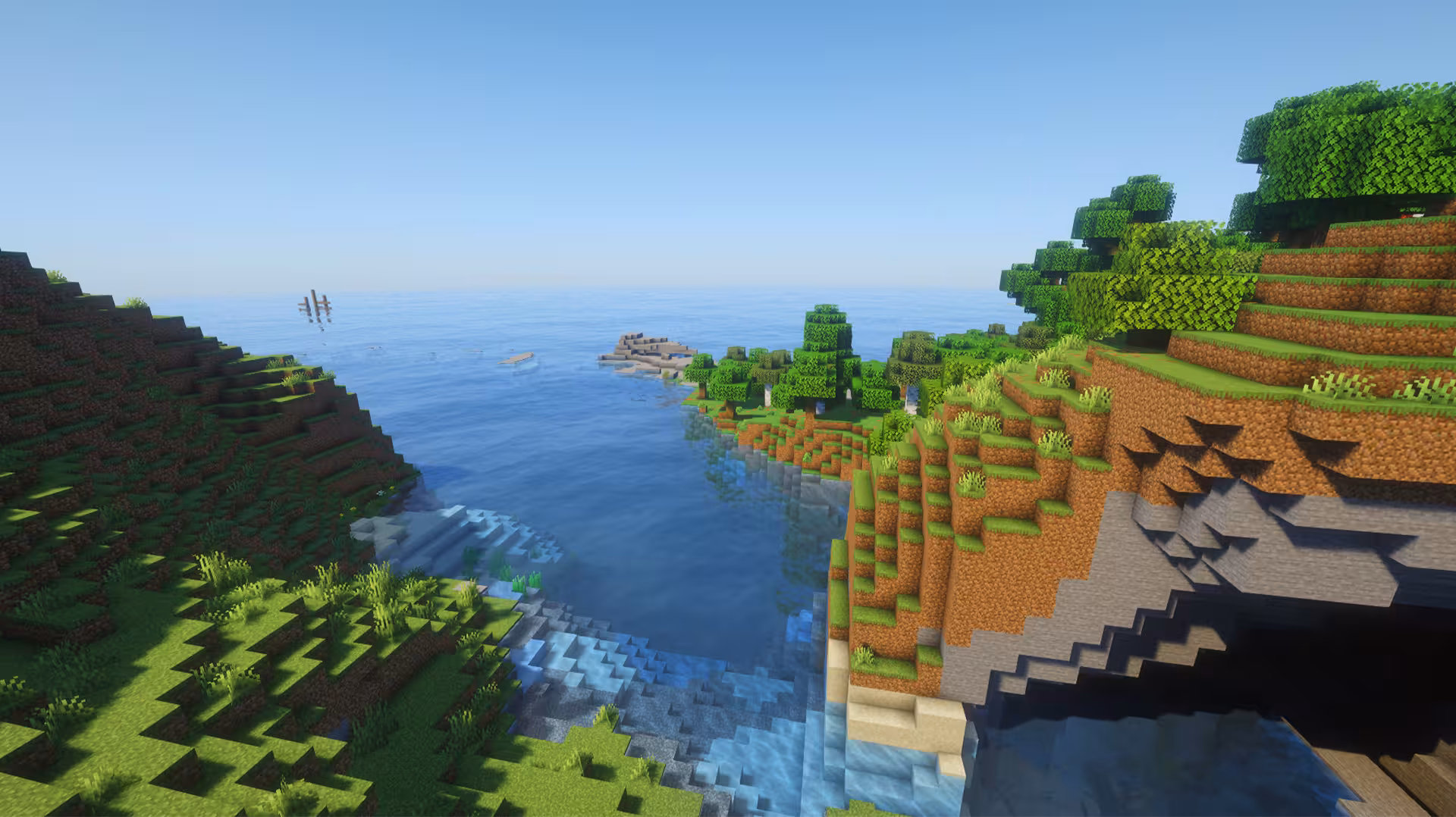 image of a Minecraft seed with an oceanside open plains overlooking the ocean with jagged peaks